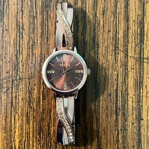 Folio Crystal Half Bangle women’s/ladies Watch. Keeps great time, new battery.